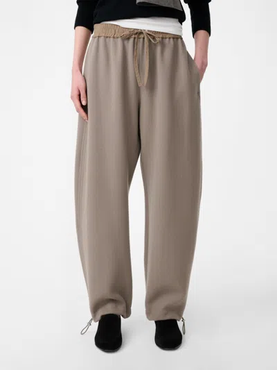 Studio Nicholson Elastic Waist Wool Trouser In Neutral