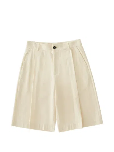 Studio Nicholson Fowld Pleat Herringbone Shorts In Neutral