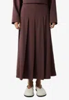 Studio Nicholson Fuse Pleated Midi Skirt In Dark Brown