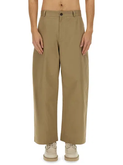 Studio Nicholson High-waisted Slim Curved Pants In Beige