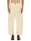 Studio Nicholson High-waisted Wide-leg Pants With Pleated Front In Nude