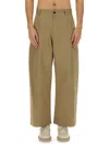 Studio Nicholson High-waisted Slim Curved Pants In Green