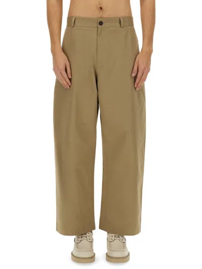 Studio Nicholson High-waisted Slim Curved Pants In Green
