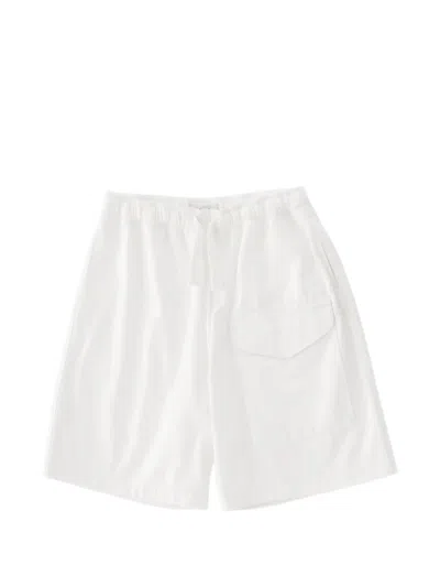 Studio Nicholson Ikaria Flap-pocket Drawstring Shorts In Neutral