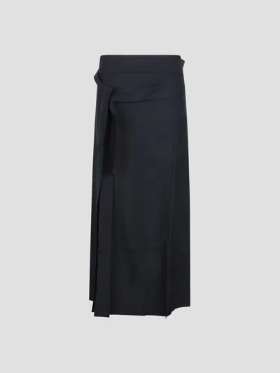 Studio Nicholson Knife Pleat Belted Kilt Skirt In Black