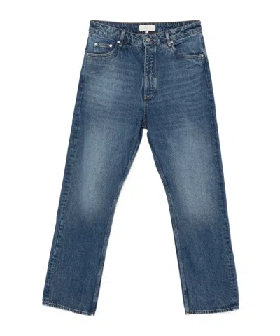 Studio Nicholson Logo Denim Trousers In Blue