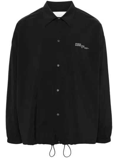 Studio Nicholson Logo-print Press-stud Jacket In Black