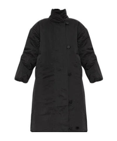 Studio Nicholson Long Down Coat With An Asymmetrical Button Closure In Black