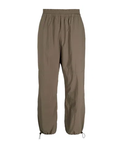 Studio Nicholson Loose-fit Elasticated-waist Trousers In Brown