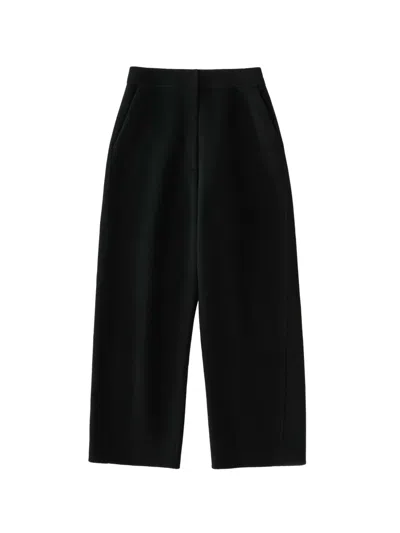 Studio Nicholson Myrtle Curved-leg Wool Trousers In Black