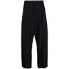 Studio Nicholson Tuck Wool Trousers In Black
