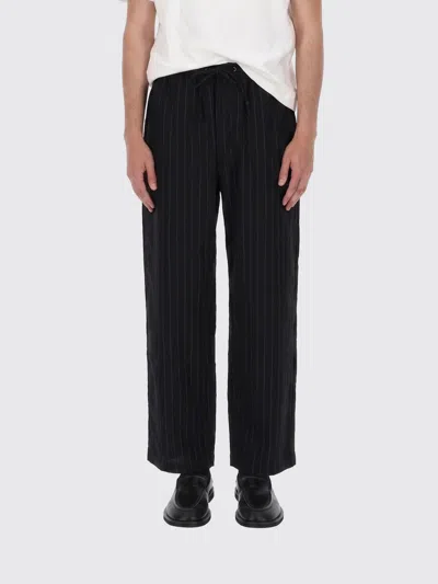 Studio Nicholson Pants Men In Black