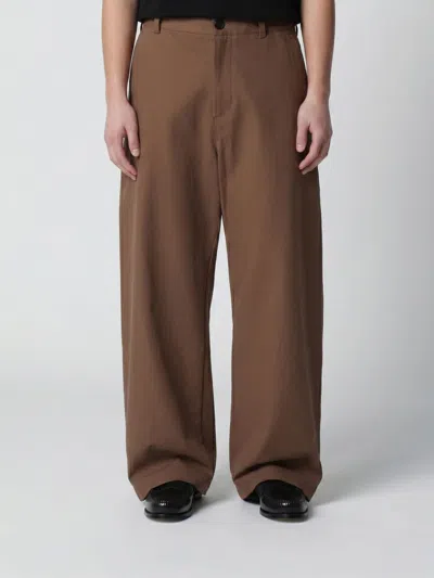 Studio Nicholson Pants  Men Color Coffee In Brown