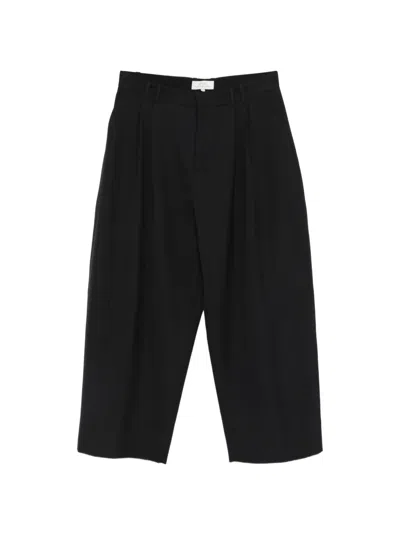 Studio Nicholson Pleated Tailored Trousers In Black
