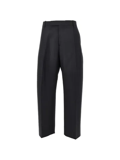 Studio Nicholson Pleated Tailored Trousers In Black