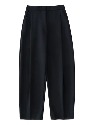 Studio Nicholson Pleated Wide-leg Trousers In Black