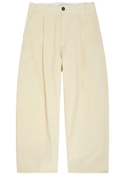 Studio Nicholson Pleated Wide-leg Trousers In Neutral