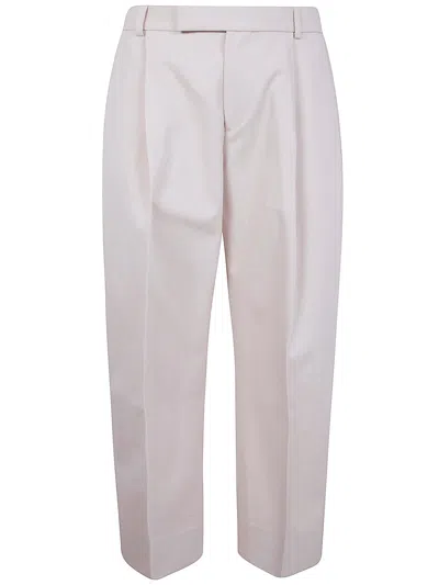 STUDIO NICHOLSON STUDIO NICHOLSON "PULL" CURVED LEG TROUSERS