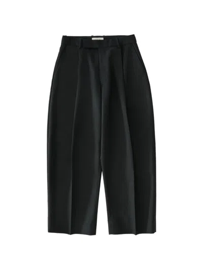 Studio Nicholson Pull Curved-leg Trousers In Black