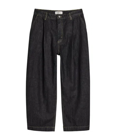 Studio Nicholson Single Pleat Wide-leg Jeans In Black