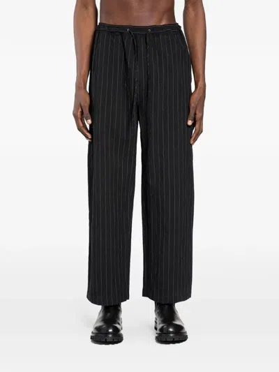Studio Nicholson Sonny Pinstripe Trousers In Black