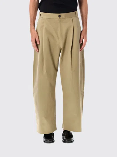 Studio Nicholson Sorte Wide-leg Pleated Cotton Trousers With Patch Pockets In Neutral
