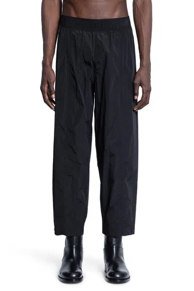 Studio Nicholson Trousers In Black