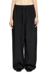 Studio Nicholson Trousers In Black