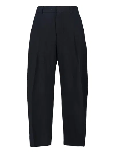 Studio Nicholson Trousers In Black