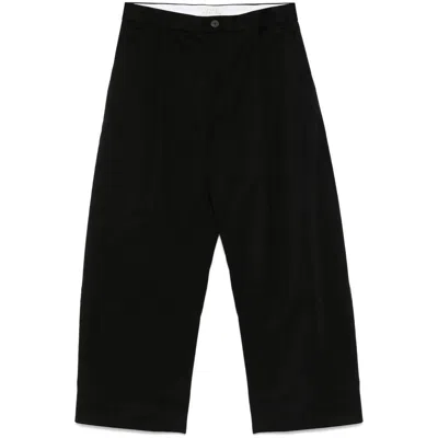 Studio Nicholson Trousers In Black