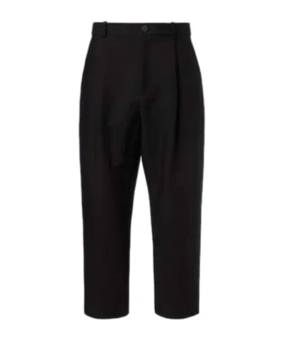 Studio Nicholson Tuck Cotton-blend Tapered Pants In Black