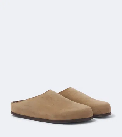 Studio Nicholson Wearing Leather Mules In Brown