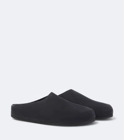 Studio Nicholson Wearing Leather Mules In Black