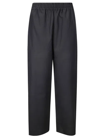 STUDIO NICHOLSON WIDE LEG TROUSERS WITH SIDE SLIT