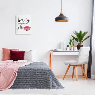 Stupell Industries Beauty Starts With Smiling Chic Lipstick Lips Design By Daniela Santiago - Floater Frame Graphic Art In Wrapped Canvas