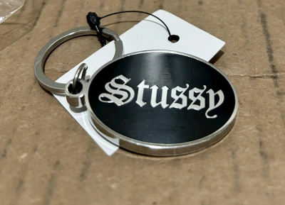 Pre-owned Stussy O.e Keychain ​​badge In Black