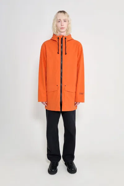 Stutterheim Stockholm Patch Raincoat In Pumpkin