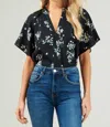 Sugarlips Magnolia Floral Ruffle Split Neck Blouse In Black In Black