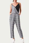 SUGARLIPS SHELA WRAP-EFFECT TWO-TONE STRETCH-JERSEY JUMPSUIT IN BLACK MULTI