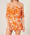 SUGARLIPS TANGELO OFF THE SHOULDER FLORAL ROMPER IN ORANGE AND WHITE