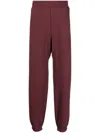 Suicoke Logo-print Cotton Track Pants In Red