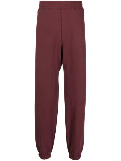 Suicoke Logo-print Cotton Track Pants In Red