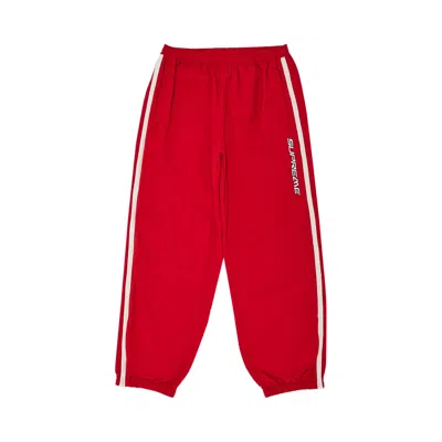 Pre-owned Supreme Contrast Zip Warm Up Pant 'red' | Men's Size L