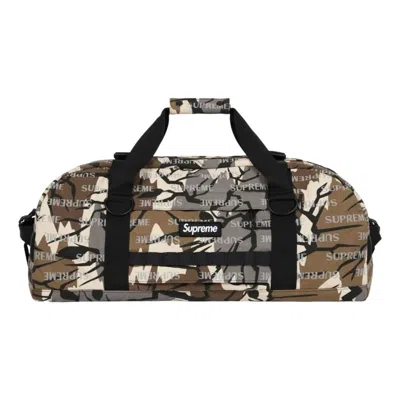 Supreme Large Camouflage-print Duffle Bag In Red