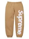 Supreme Logo Appliqué Track Pants In Brown