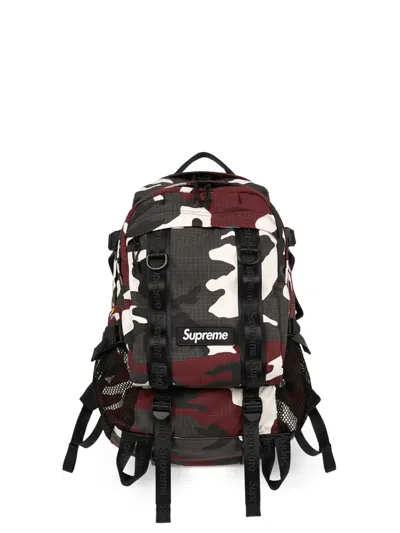 Supreme Logo-detail All-over Pattern Backpack In Red