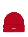 Supreme New Era® Old English Beanie Hat In Red