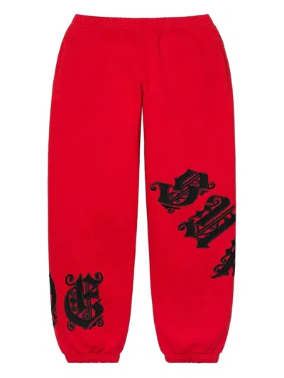 Supreme Old English Wrap Trackpants In Red