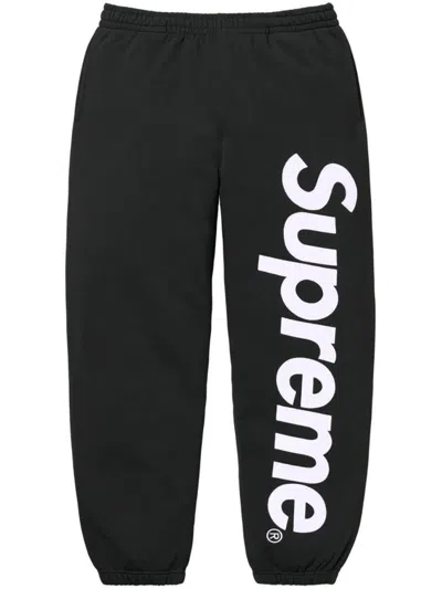 Supreme Satin-appliqué Cotton Track Pants In Schwarz