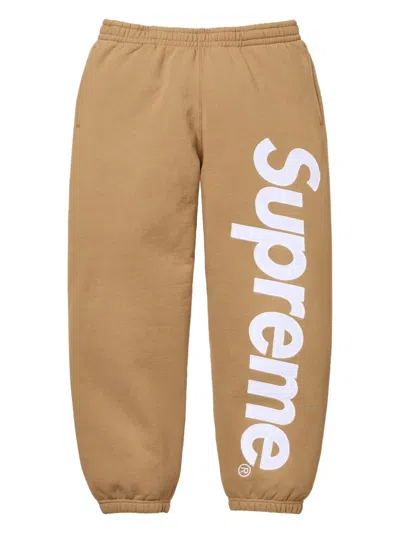 Supreme Satin-appliqué Track Pants In Brown